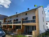 Gartenansicht - Reihenmittelhaus mit KFZ-Stellplatz im Wohngebiet Neue Höfe in Eschweiler-Dürwiß