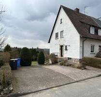 Solide Doppelhaushälfte mit großzügigem Garten und Entwicklungspotenzial in ruhiger Lage von Warburg