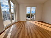 lichdurchflutetes Wohnzimmer - Exklusiver NEUBAU - lichtdurchflutete 3-Zimmer-Wohnung mit Balkon und Grünblick