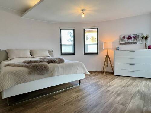 Schlafzimmer 1 im Erdgeschoss - 