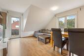 Wohnzimmer Bild 1 - 2 Zimmer Etagenwohnung zum Kaufen in Großenkneten