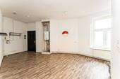 Wohnzimmer mit offener Küche - 