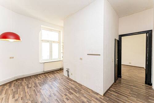 Wohnzimmer mit offener Küche - 