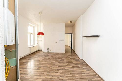 Wohnzimmer mit offener Küche - 