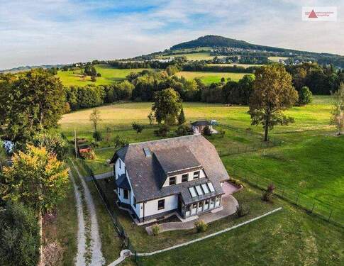 Luftbild - Naturparadies: Zweifamilienhaus mit 17.838 m², Wärmepumpe & Ferienvermietung in Annaberg-Buchholz