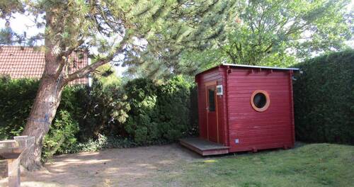 302. Südl. Gartenbereich mit Sauna des Ferienhause - 