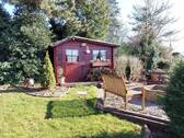 Die Gartenhütte mit zusätzlichem Sitzplatz - 