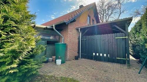 Gebäudeansicht 2 - 4 Zimmer Doppelhaushälfte in Nossentiner Hütte