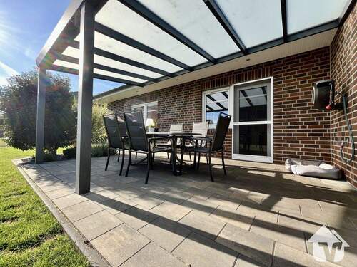 Garten mit überdachter Terrasse - 