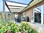 Garten mit überdachter Terrasse - 