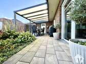 Garten mit überdachter Terrasse - 