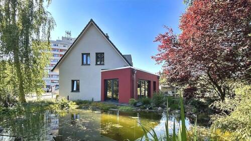 Teich mit Haus - 4 Zimmer Doppelhaushälfte zum Kaufen in Lübeck