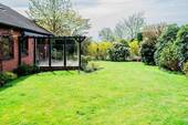 Garten - Einfamilienhaus mit 128,10 m&sup2; in Schleswig zum Kaufen