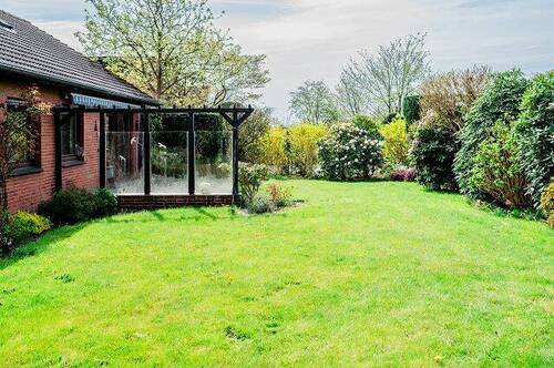 Garten - Einfamilienhaus mit 128,10 m&sup2; in Schleswig zum Kaufen