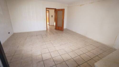 das Wohnzimmer - 1 Zimmer Mehrfamilienhaus, Wohnhaus in Moers