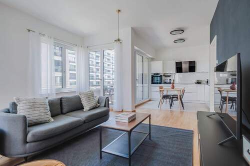Wohnzimmer - Bezugsfreie Neubauwohnung mit 3 Zimmern & 2 Bädern in begehrter Lage!