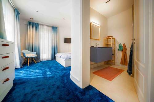 Schlafzimmer mit Duschbad - 