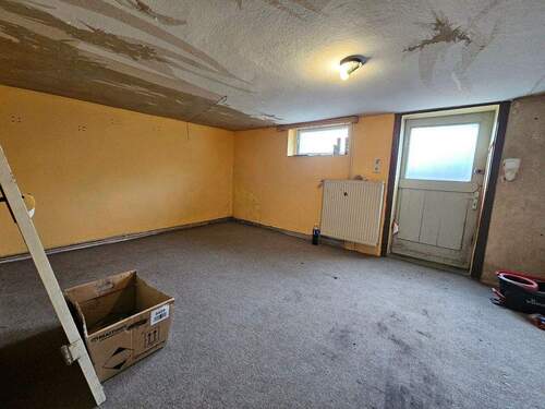 Raum im Keller m. Gartenzugang.jpg - 