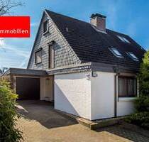 Doppelhaushälfte mit Vollkeller, Garage und separatem Büro in begehrter Lage von Elmshorn!