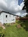 Hausansicht - Günstiges EFH mit Terrasse, Garage, Dusche und sonnigem Grundstück am grünen Ortsrand