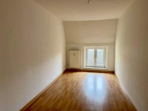 Dachgeschoss mit Holzbalken - 