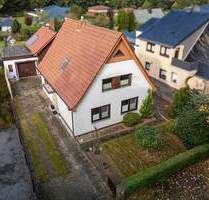 Geestland - Debstedt Individuelles Einfamilienhaus mit zwei Garagen auf großem Grundstück