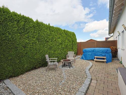 Geschützter, privater Terrassenbereich hinter dem Haus - 