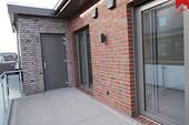 Balkon mit externem Abstellraum - Etagenwohnung mit 100,20 m&sup2; in Wiesmoor zur Miete