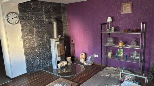 Wohnzimmer - Einfamilienhaus mit 70,00 m² in Nidderau zum Kaufen