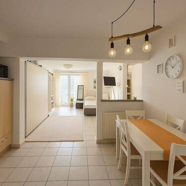 Wohn und Esszimmer - 1 Zimmer Etagenwohnung in Friedrichshafen