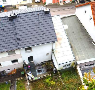 Gebäuderückseite - Reihenmittelhaus mit 105,00 m² in Saarbrücken zum Kaufen