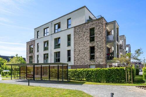 Hausansicht Rückseite - Schöne Erdgeschosswohnung am Fleester Höpen mit Traumküche und tollem Bad!