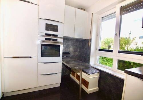 Küche mit Ostausrichtung - Etagenwohnung mit 72,80 m² in München zum Kaufen