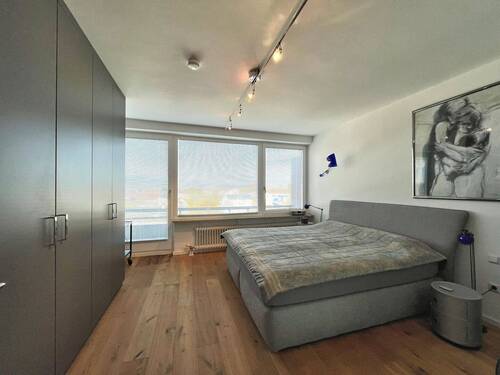 Schlafzimmer mit Balkonzugang - 