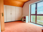 Zimmer im Dachgeschoss - 