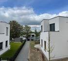 Blick zwischen Villa 10 und 11 - Terrassenwohnung mit 112,30 m&sup2; in Binz zum Kaufen