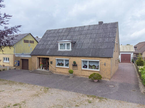 Bild 2 - 6 Zimmer Einfamilienhaus zum Kaufen in Tielen