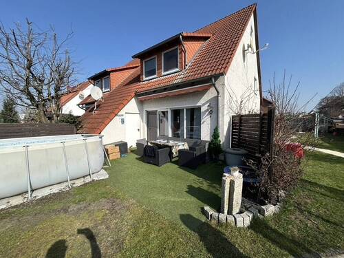Blick auf die Terrasse - Doppelhaushälfte in Cramme - vermietet, mit Garten und Entwicklungspotenzial