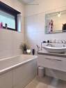 Badezimmer mit Wanne - 