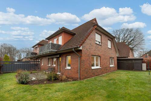 Rückansicht mit Garten - Traumhafte Erdgeschoss mit Garten