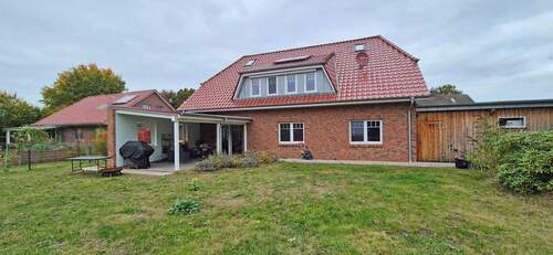 Hausansicht_hinten - 7 Zimmer Mehrfamilienhaus, Wohnhaus zur Miete in Sottrum