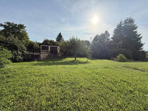 Titelbild - Bauplatz mit Doppelgarage in jungem Wohnumfeld