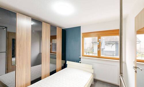 Schlafzimmer EG - Mehrfamilienhaus, Wohnhaus mit 195,40 m&sup2; in Wertheim zum Kaufen