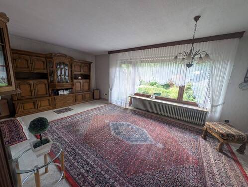 Wohnzimmer mit Zugang zur Terrasse - 