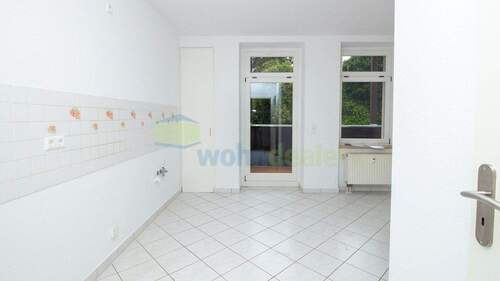 Küche mit Balkonzugang - 