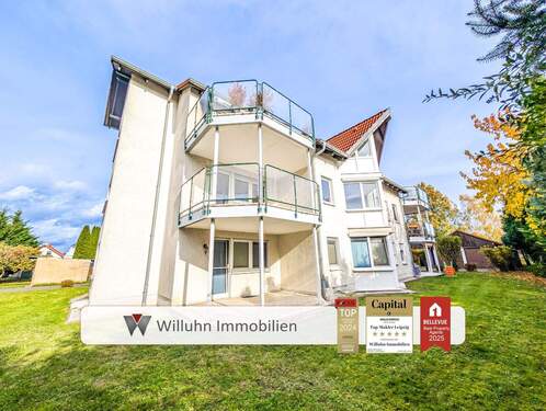 Rückansicht - BEZUGSFERTIG: Traumhaft helle 3RW mit Balkon, Garage und Stellplatz 