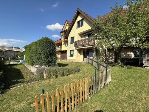 Außenansicht Gartenseite - Ideal für die große Familie: Meisterhaft Stein auf Stein gebautes 1- bis 2 Familienhaus mit Garten