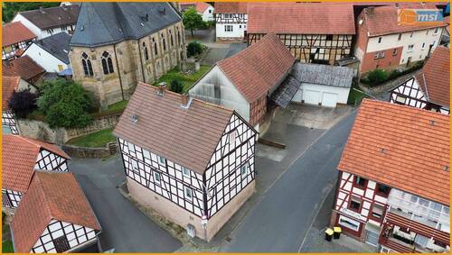Blick auf das Haus - 4 Zimmer Einfamilienhaus zum Kaufen in Neustadt (Hessen) / Mengsberg