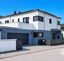 Modernes Einfamilienhaus mit sonniger Dachterrasse - stilvolles Wohnen im Herzen von Bernau am Chiemsee