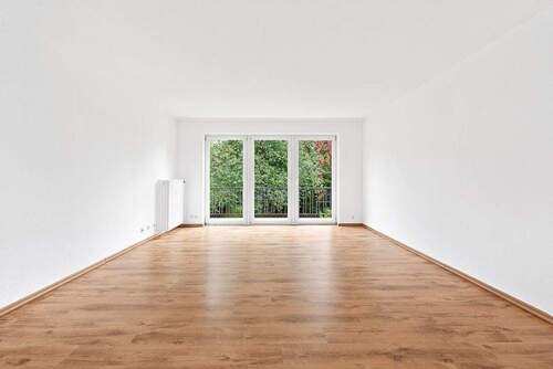 Wohnbereich - Charmante 3 Zimmer - Eigentumswohnung mit Südbalkon und Blick ins Grüne - bezugsfrei und modernisierungsbereit!